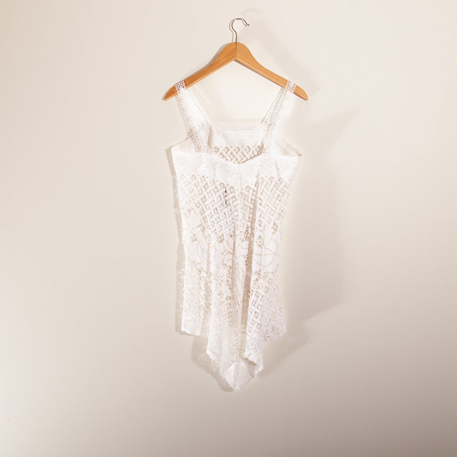 Top i räddad spetsgardin