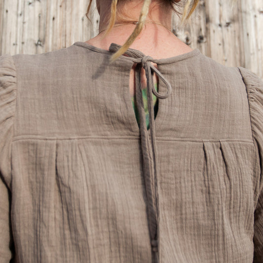 Hanna blus med täckande ärm