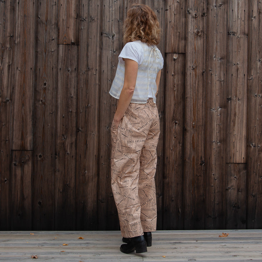 Pink trousers in newspaper fabric, M/L