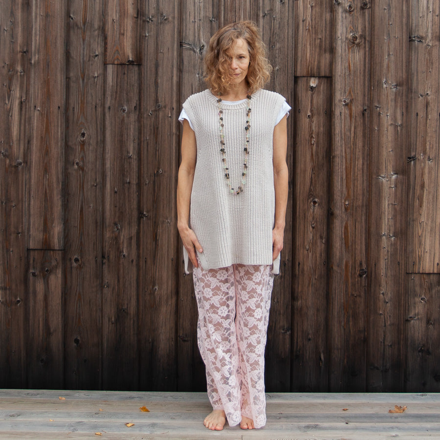 Pink trousers made from recycled lace