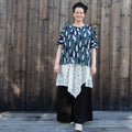 Blue green blouse with leaves