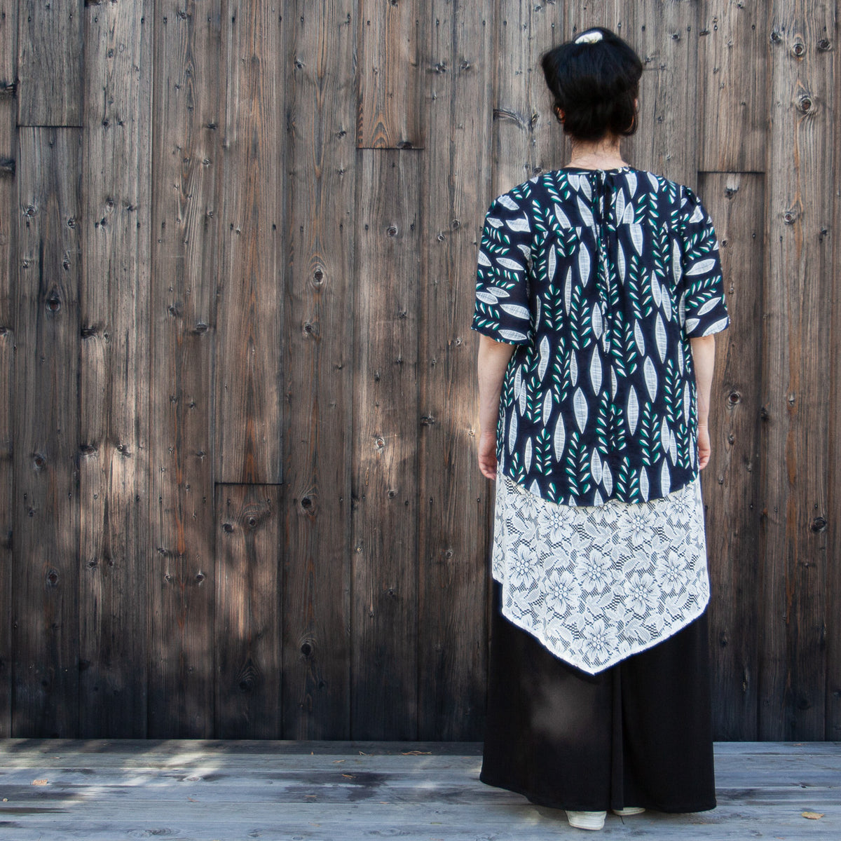 Blue green blouse with leaves