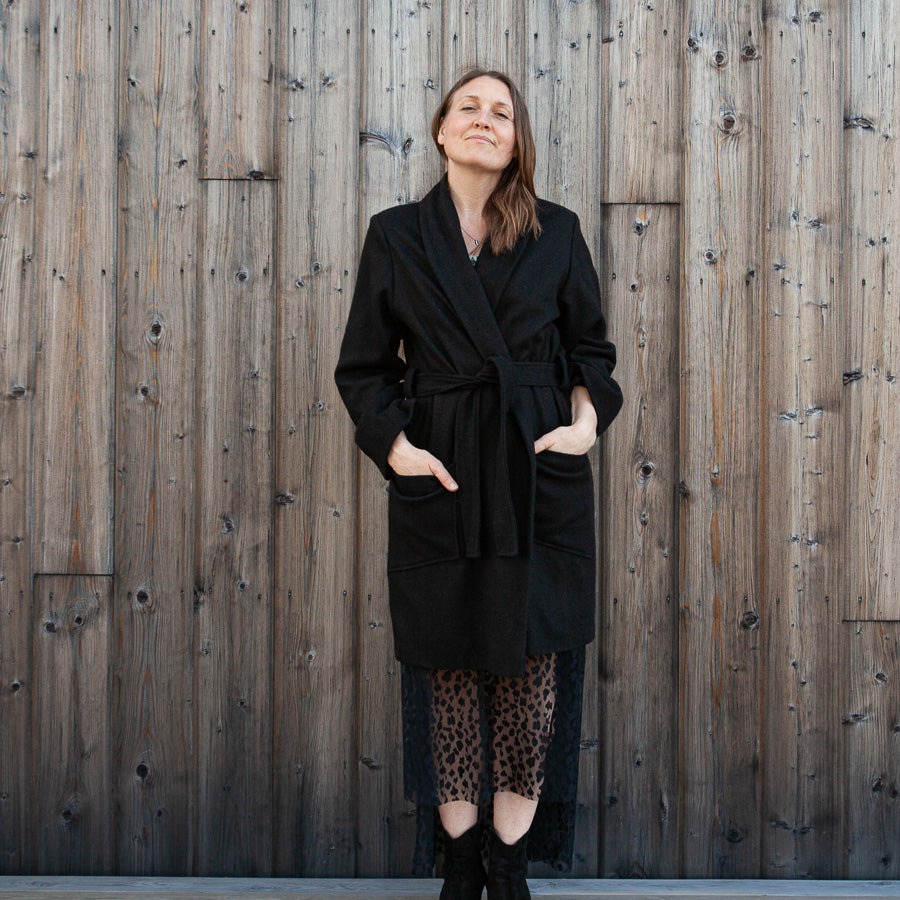 Black coat made from recycled wool