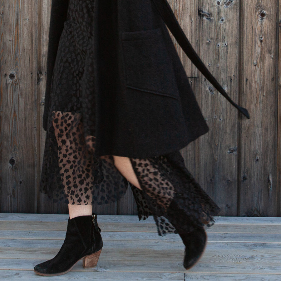 Black coat in a coat roll