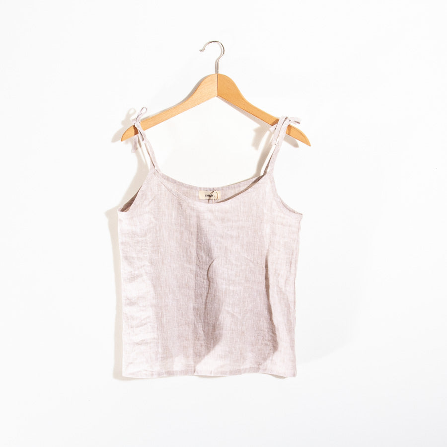 Beige linen top with a bow at the shoulder