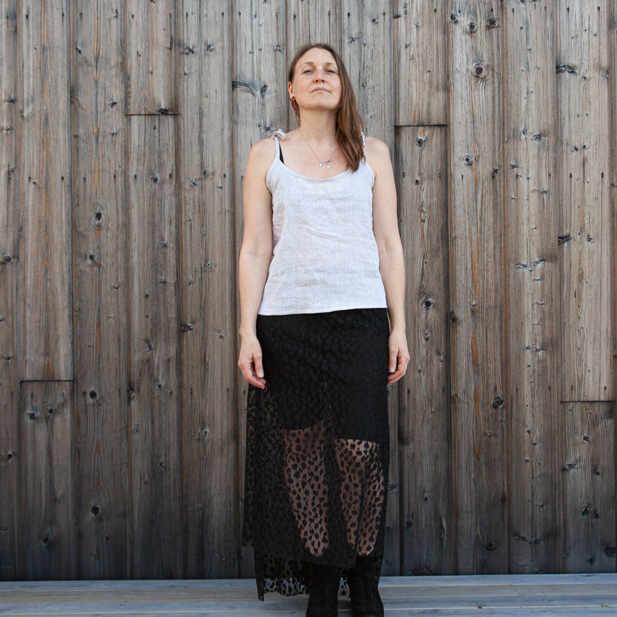 Beige linen top with a bow at the shoulder