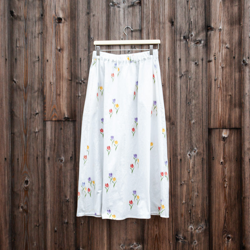 White skirt with tulips in salvaged curtain fabric